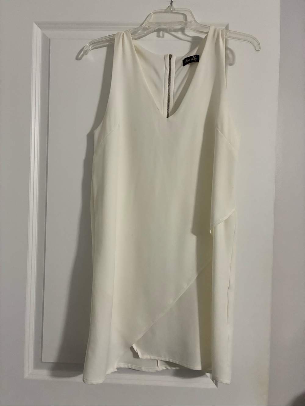 Sleeveless V-Neck Mini Dress in Cream by Bebe